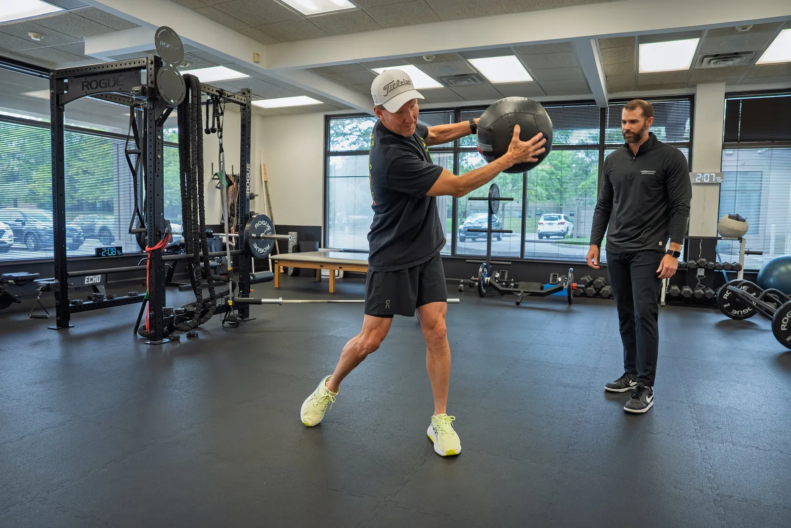 Golfer striking the ball at impact during a full swing