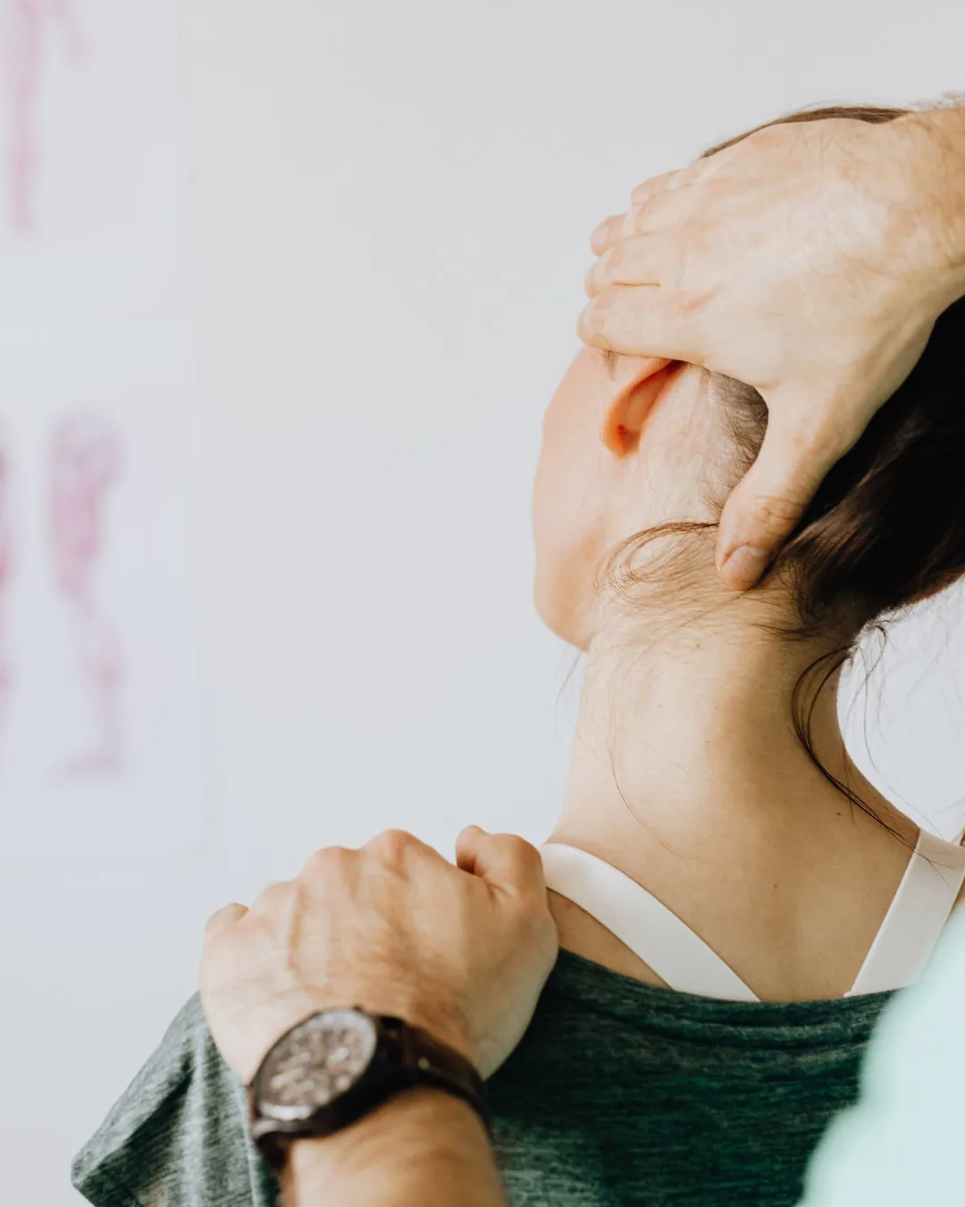 Hands-on muscle release therapy on a patient